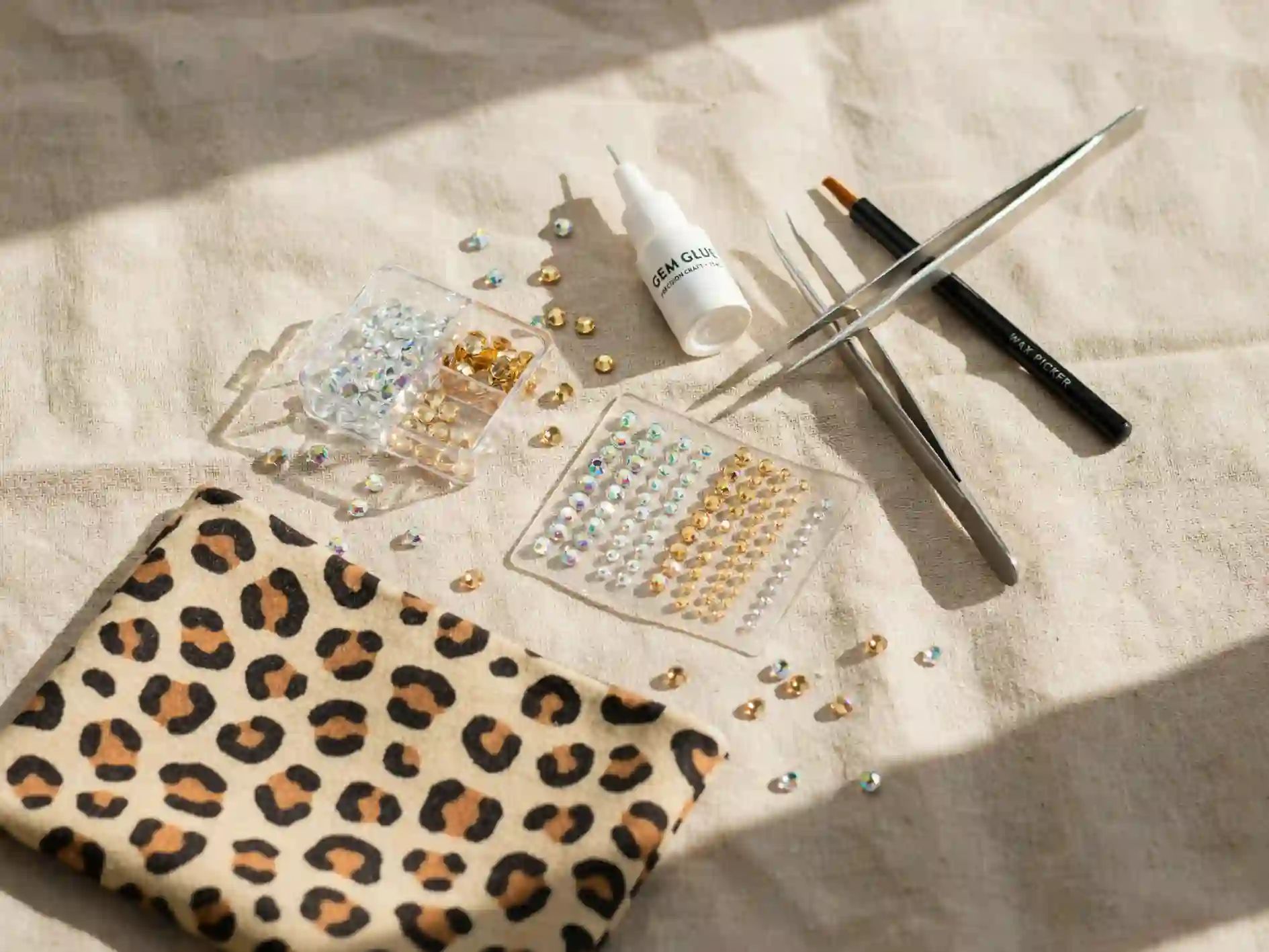cheetah print bedazzled tumbler, bedazzled cheetah print nails, rhinestone cheetah wall art DIY