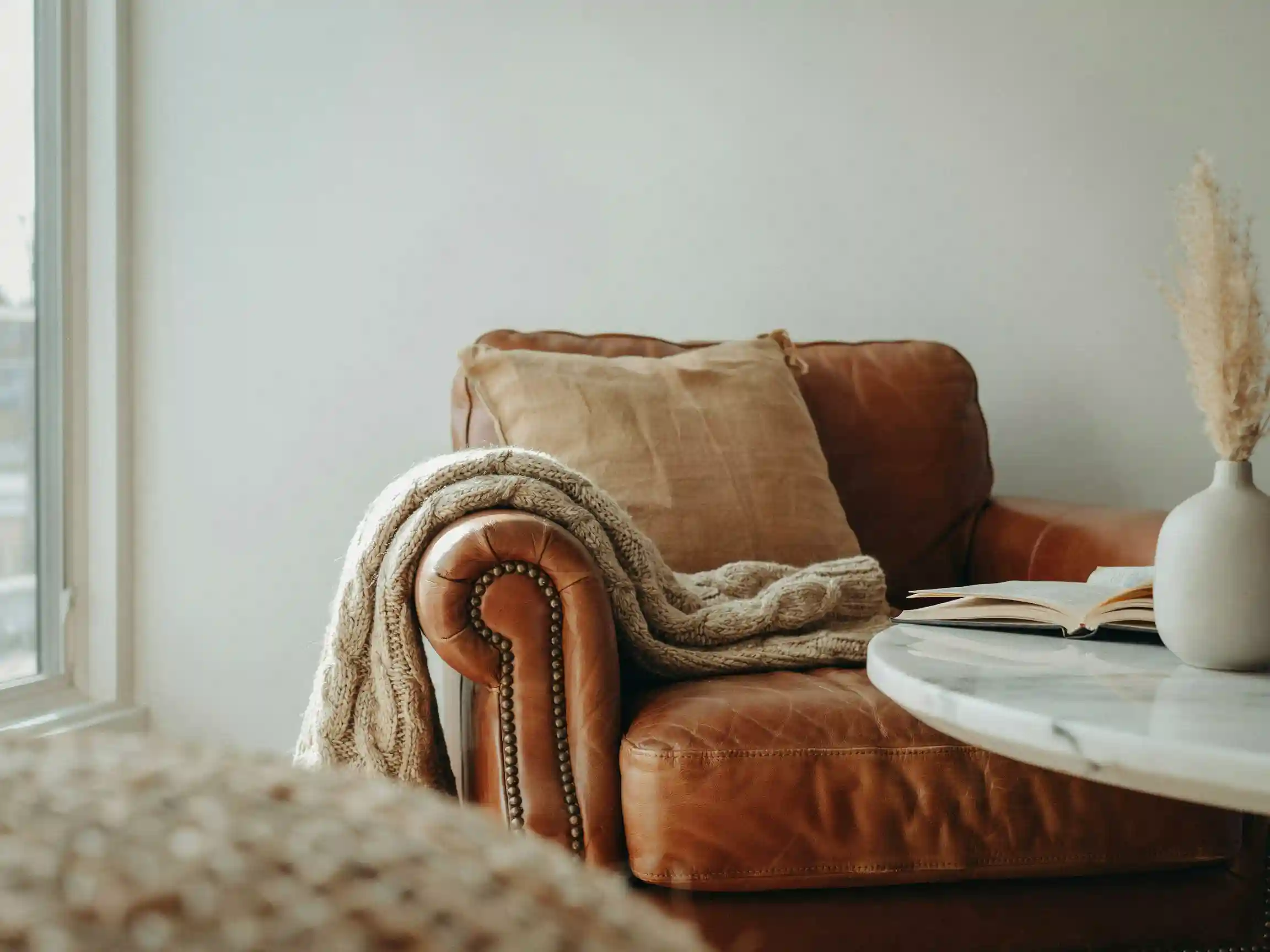 chic room decor neutral living room, chic statement lighting idea, chic layered textures decor