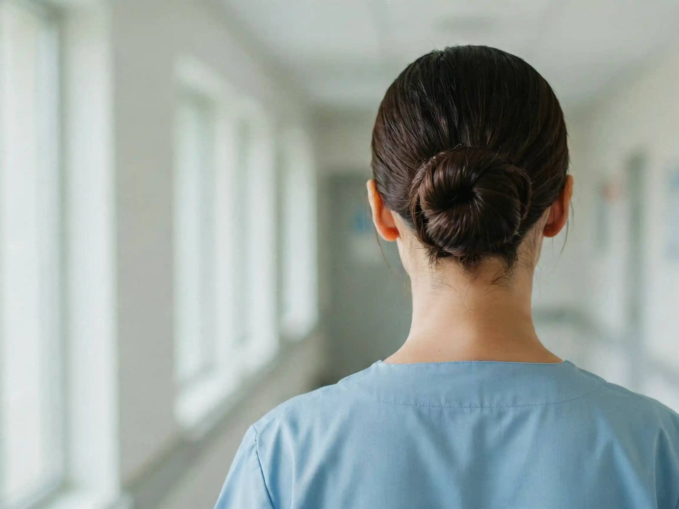 healthcare hairstyles low bun, healthcare hairstyles braided bun for nurses, nurse hairstyle ponytail