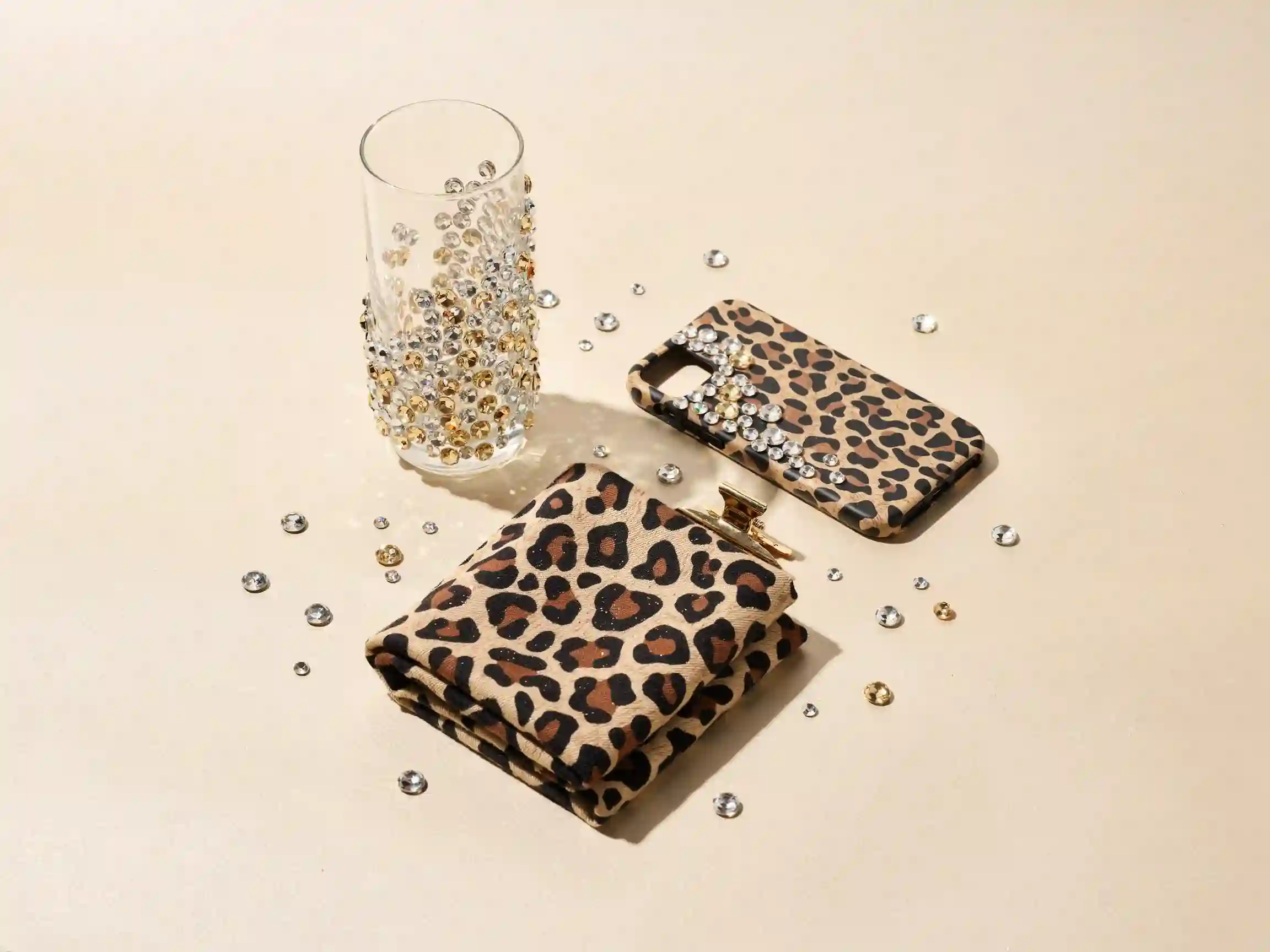 cheetah print bedazzled tumbler, bedazzled cheetah print nails, rhinestone cheetah wall art DIY