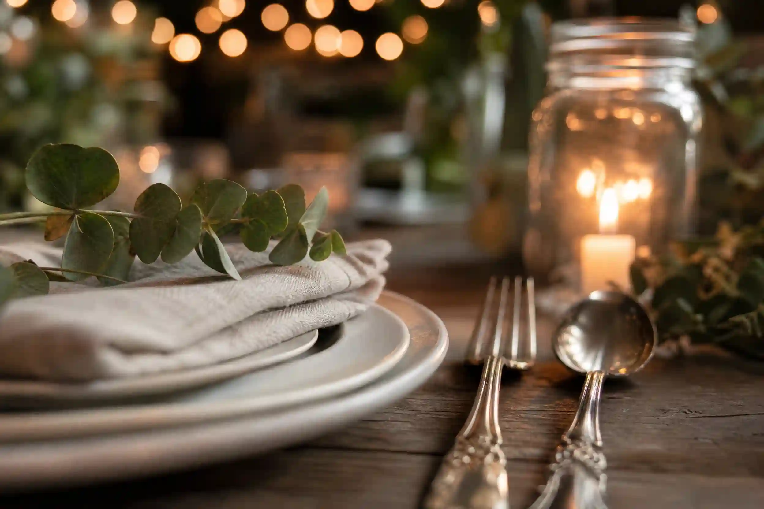 small backyard wedding ideas with string lights and long table,cozy small backyard wedding ideas with mismatched chairs and florals,budget-friendly small backyard wedding ideas table setup